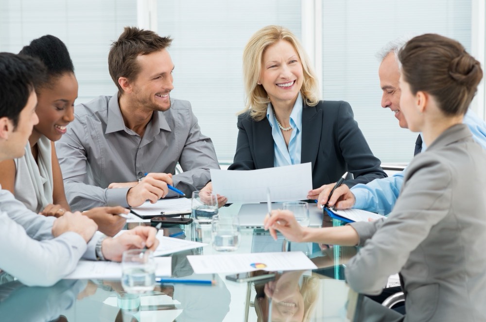 Consultants meeting around a table